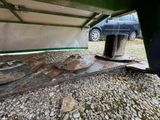 a close up of the bottom of a boat on the ground