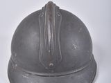 a helmet that is sitting on a white surface