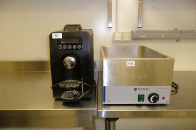 a machine that is sitting on a table in a kitchen