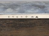 a close up of a metal box with numbers on it