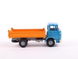 a blue and orange toy truck on a white surface