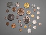 a lot of coins that are on the table