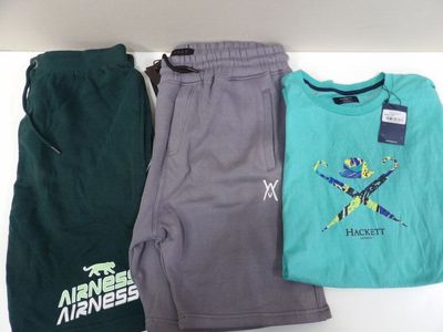 three pairs of men ' s clothing including a t - shirt, sweatpants and a bag