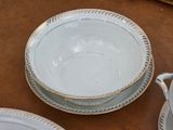a plate and a bowl sitting on a table
