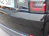 a close up of a car ' s rear end with a license plate on it