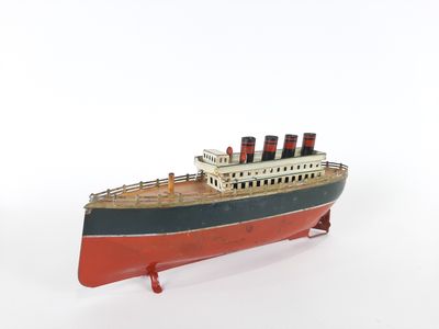 ARNOLD. Paquebot en tôle lithographiée, moteur fonctionnel, …