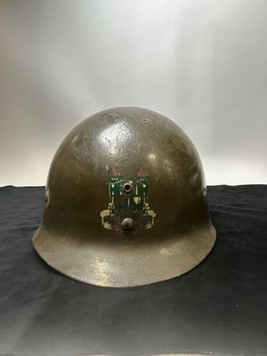 a helmet with a circuit board on it on a table