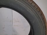 a close up of a tire tire on a white surface