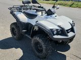 an image of a four wheeler atv parked on the side of the road