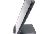 a cell phone that is sitting on top of a stand
