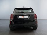 the back end of a black mini countryman parked in a garage