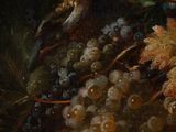 une image représentant un tableau sur lequel figure une grappe de raisin posée sur une table