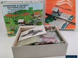 a box with a train set in it and a box with a train set in it