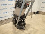 an image of a vacuum on a dolly in a room