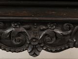 a close up of a wooden table with a clock on it