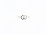 une image d'une bague en diamant sur fond blanc