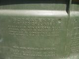 a close up of a green military tank with a plaque on it