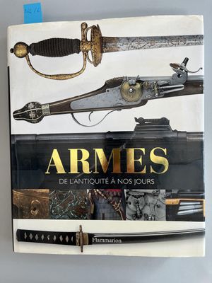 une image représentant un livre sur lequel figurent une arme à feu et une épée