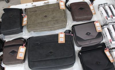 a lot of bags that are sitting on a table