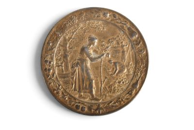 une image représentant une pièce d'or sur laquelle figurent un homme et une femme