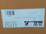 a cardboard box with a sticker on the side of it
