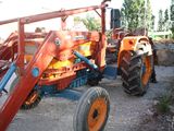 a tractor that is sitting in the dirt