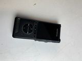 a cell phone that is laying on a table