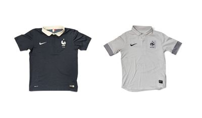 a couple of polo shirts sitting next to each other on a white surface