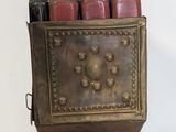 a small wooden box with a bunch of salt and pepper shakers in it