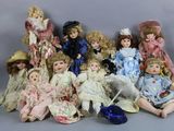 a lot of dolls that are sitting together on the floor