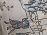 a close up of a painting of a man on a ladder