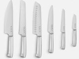 five knives that are lined up next to each other