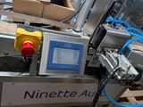 an image of a machine that is working on a piece of paper