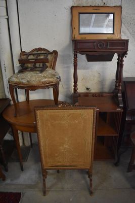 a small table with a mirror on top of it next to a chair and a table with a mirror on top of it