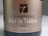 a bottle of wine that is sitting on a table