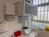 an image of a kitchen with a sink and a window