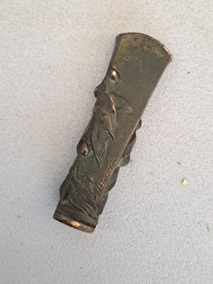a small metal object that is on a table