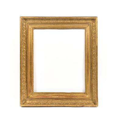 an antique gold frame on a white background