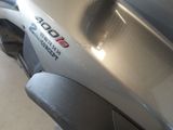 a close up of a motorcycle with a sticker on it
