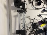 a lot of wires and other electronics on the table