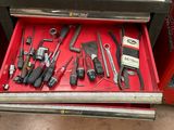 a drawer full of tools in a store