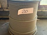 a rope that is on the ground near a window