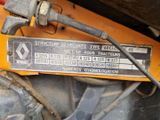 une image montrant un gros plan du moteur d'un tracteur