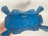 a person holding a blue plastic object in their hand