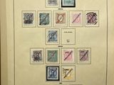 a book with a bunch of different stamps on it