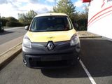 a yellow and black van parked in a parking lot