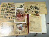 beaucoup de vieux objets militaires exposés sur une table