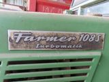 a close up of a green truck with a sign on it