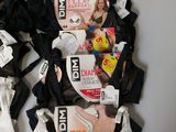 many bras that are laying on a table