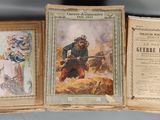 deux vieux livres avec des images d'hommes assis sur une table